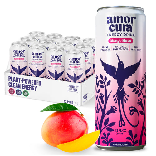 Amor Cura Mango Maca energy drink can with a box of drinks and a mango on a white background
